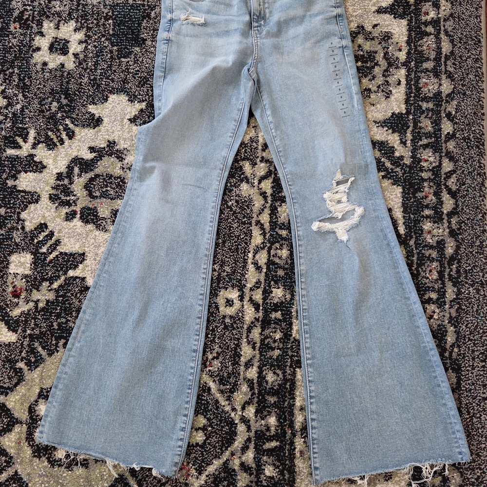 Distressed Light Blue Flare Jeans